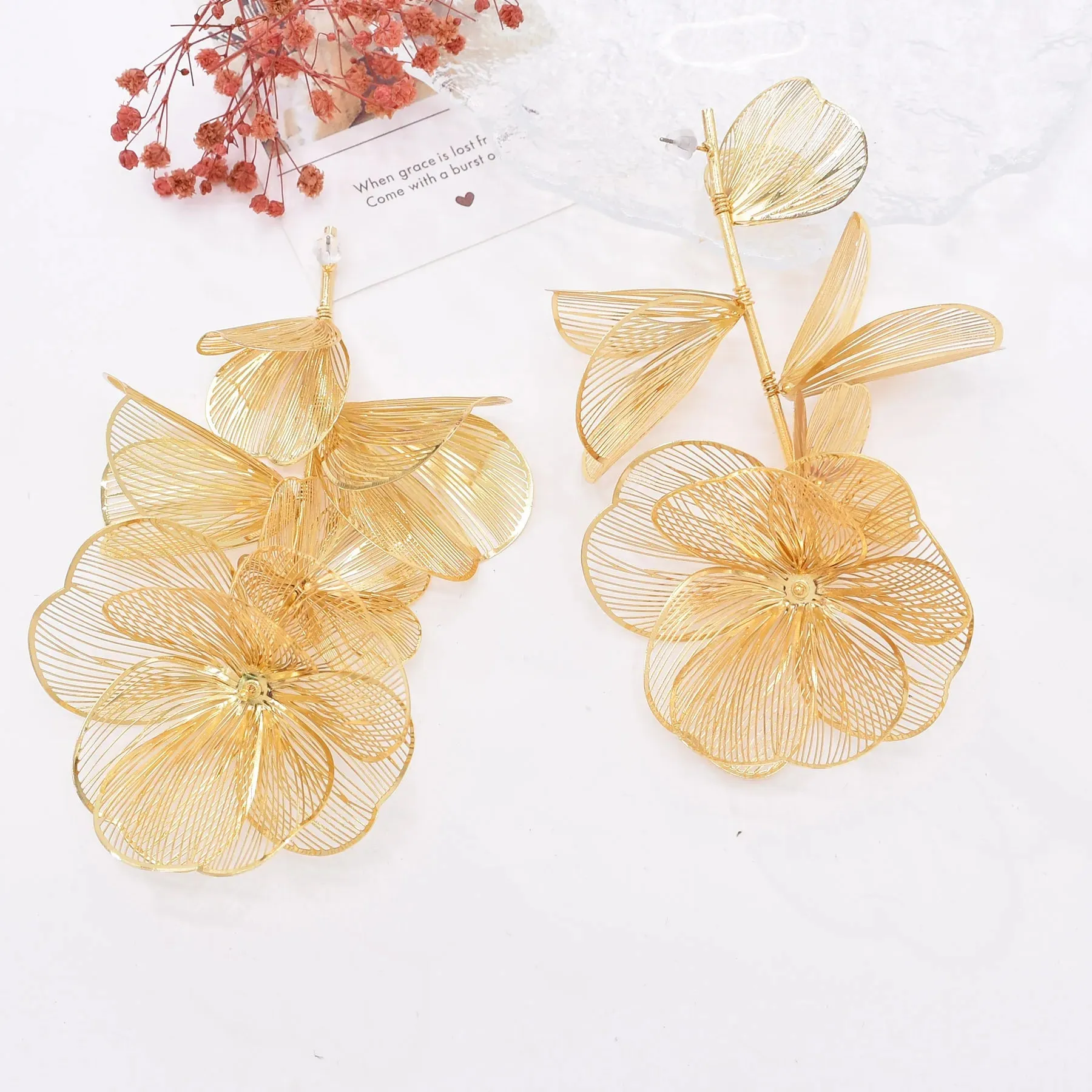 Golden Hollow Flower Leaf Long Earrings