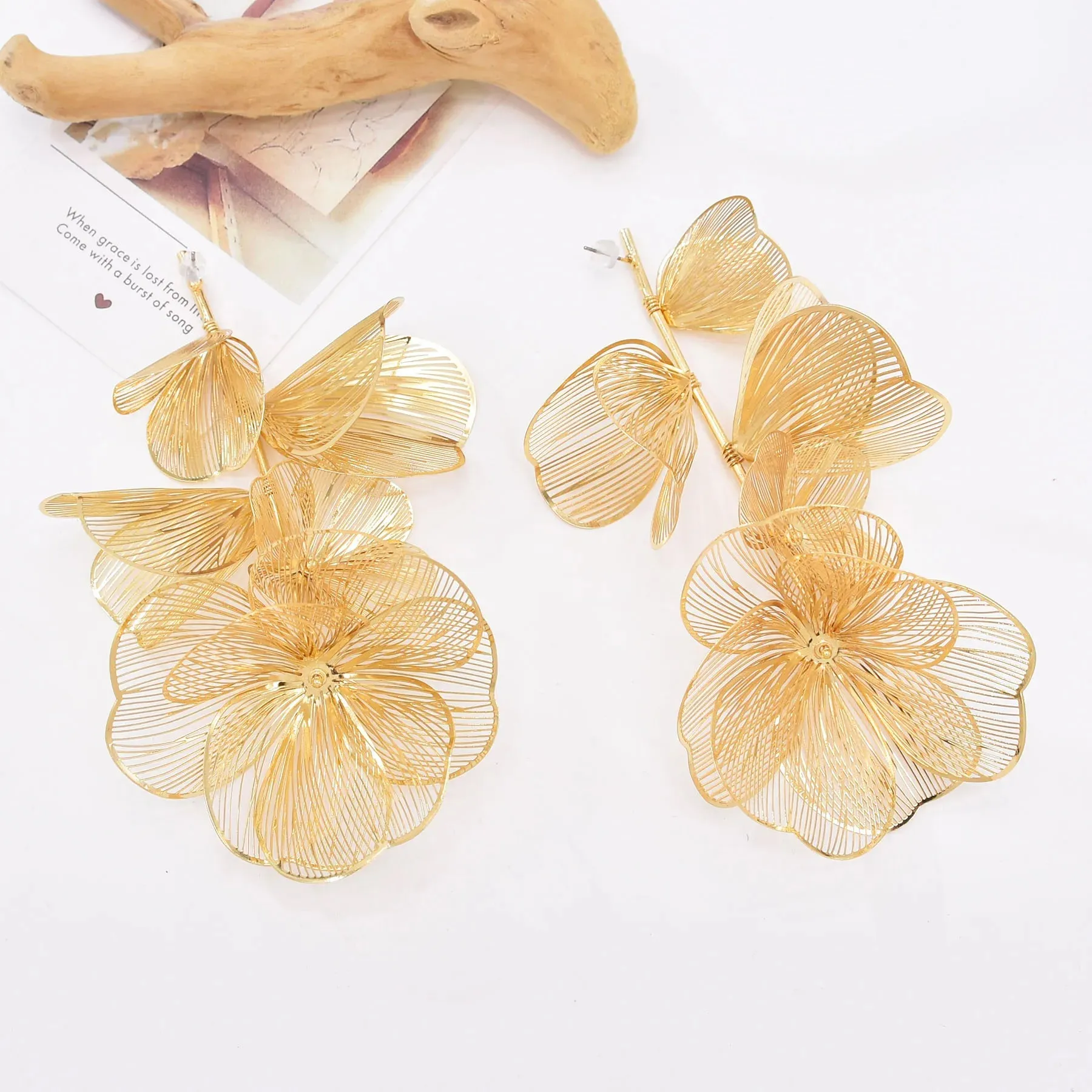 Golden Hollow Flower Leaf Long Earrings