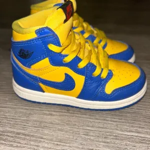 Nike Air Jordan 1s Kids' Sneakers - Blue and Yellow (Rams colors)