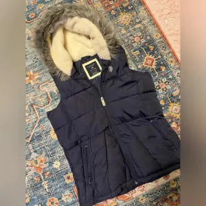 us polo assn. padded jacket with a fur hood